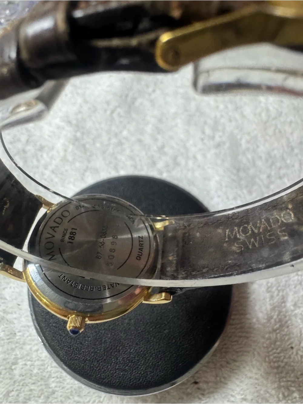 #120 Movado Gold Tone Case White Dial Watch with Brown Leather Strap
